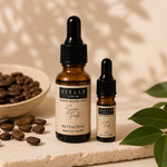 Vielle Serum Scar Fade size comparison: 1 oz full-size bottle next to 5 ml travel mini with coffee beans