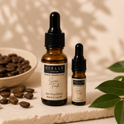 Vielle Serum Scar Fade size comparison: 1 oz full-size bottle next to 5 ml travel mini with coffee beans