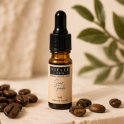 Vielle Serum Scar Fade 5 ml travel mini in amber dropper bottle with kraft label, styled with coffee beans and greenery