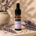 Vielle Serum Signature Formula 5 ml travel mini in amber dropper bottle with lavender label, surrounded by fresh lavender sprigs